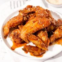 Specialties Chicken Wings in Garlic Sauce (8) menu