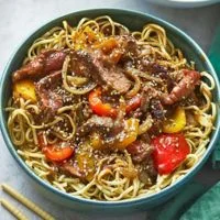 Noodles Flat Rice noodles topped with Peppered Steak price